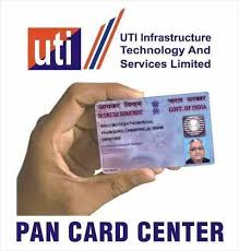 Hand holding a PAN card โ UTI Infrastructure Technology and Services Limited, PAN Card Center